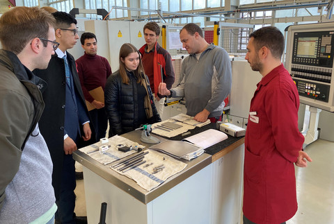 Students learn about the rolling process